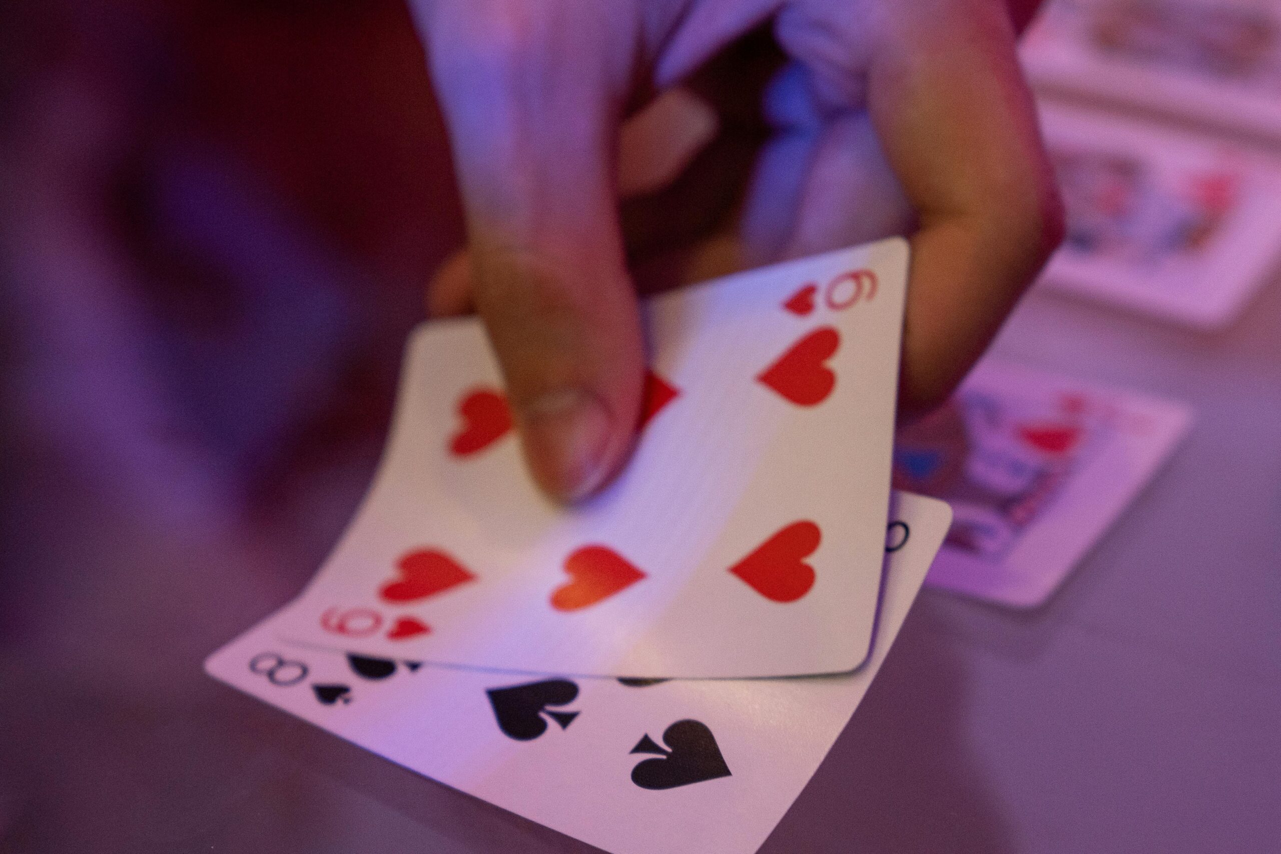 player holding poker cards
